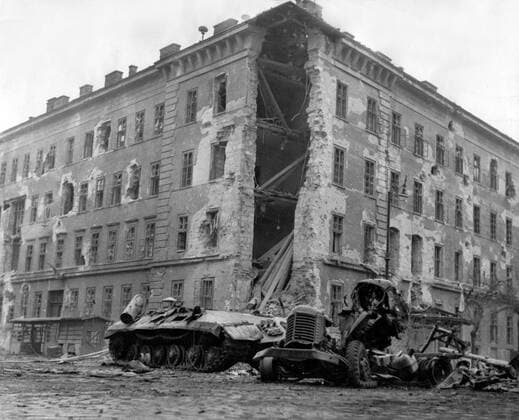 Nov 01, 1956 - Budapest, Hungary - The Hungarian Revolution of 1956 was a spontaneous nationwide revolt against the Stalinist government of Hungary and its Soviet-imposed policies, lasting from 23 October until 10 November 1956. It began as a student demonstration which attracted thousands as it marched through central Budapest to the Parliament building. After the revolt spread quickly across Hungary, and the government fell, thousands organized into militias, battling the State Security Police and Soviet troops. On 4 November, a large Soviet force invaded Budapest. By January 1957, the new Soviet-installed government had suppressed all public opposition. PICTURED: Destroyed soviet tank. Budapest Hungary  - ZUMAk09