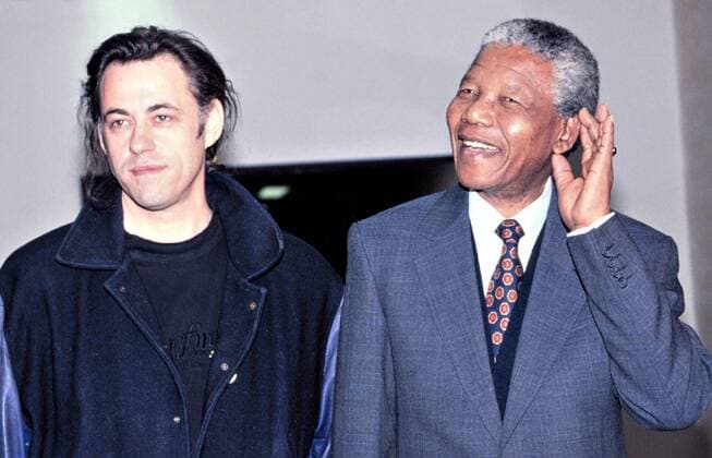 Irish singer, songwriter and activist Bob Geldof (L) and Nelson Mandela pictured in 1991. Gallo000018310