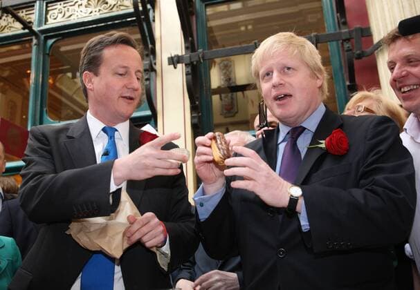 Conservative Party leader David Cameron and Mayor of London Boris Johnson celebrate St.Georges day whilst on the campaign trail at Leadenhall market on April 23 2010 London,England.  LON2010042303