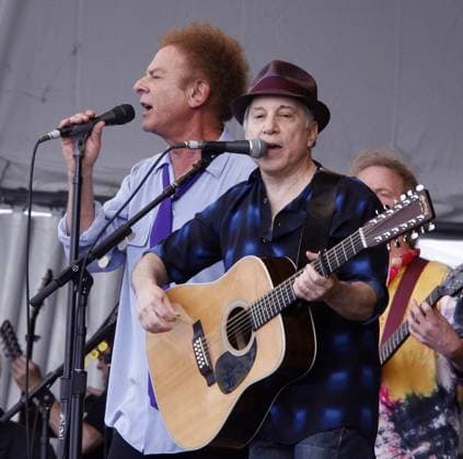 Art Garfunkel, left, and Paul Simon reunite at the Louisiana Jazz and Heritage Festival April 24, 2010, in New Orleans.  NOP2010042404