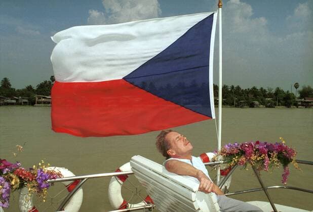 Czech President Vaclav Havel takes a rest below Czech national flag at a river cruising boat during his official visit to Thailand on February 11, 1994. CTK Photo Igor Zehl  CTKPhoto00081709