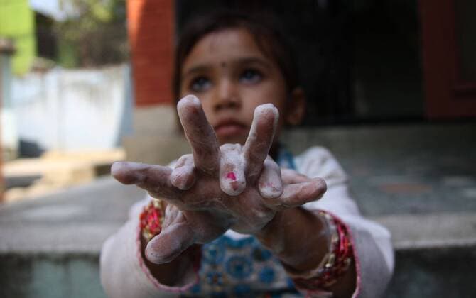 (121015) -- KATHMANDU, Oct. 15, 2012 (Xinhua) -- A girl washes her hands to mark the Global Handwashing Day in Kathmandu, Nepal, Oct. 15, 2012. Various events were organized in the country on Monday to celebrate the day. (Xinhua Sunil Sharma) NEPAL-KATHMANDU-GLOBAL HANDWASHING DAY 