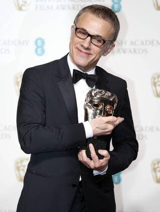 (130211) -- LONDON, Feb. 10, 2013 (Xinhua) -- Austrian-German actor Christoph Waltz poses with the award for best supporting actor for his performance in the film Django Unchained in the press room of the BAFTA British Academy Film Awards 2013 at the Royal Opera House in London, Britain, on Feb.10, 2013. (Xinhua Wang Lili)(ctt) BRITAIN-LONDON-FILM-BAFTA-AWARDS 2013 