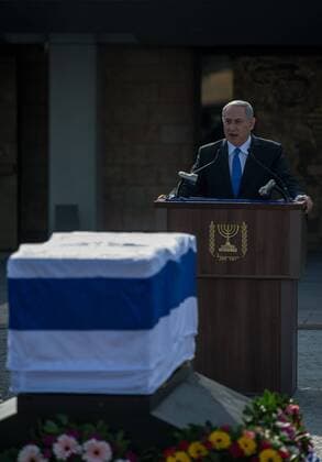 60915444 Israeli Prime Minister Benjamin Netanyahu addresses a state memorial ceremony of former Israeli Prime Minister Ariel Sharon at Israel s Knesset (parliament) in Jerusalem, on Jan. 13, 2014. The state memorial service was held here on Monday attended by international leaders, including U.S. Vice President Joe Biden and Quartet representative and former British Prime Minister Tony Blair. Former Israeli Prime Minister Ariel Sharon, a controversial figure that altered the course of the Middle East, died at a hospital near Tel Aviv in central Israel at the age of 85 on Saturday, Monday, 13th January 2014. Picture by imago i-Images UK ONLY imagox xi-Images  IIM-1257-0019