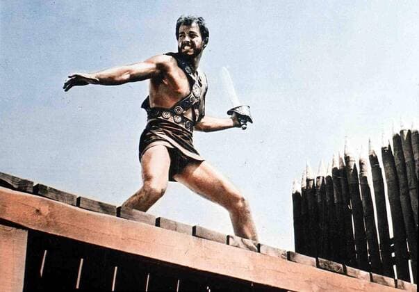 Richard Harrison Der mutige Gladiator Darius (Richard Harrison) plant mit sechs weiteren Gladiatoren eine Revolte, um die Stadt Sparta von Tyrannen zu befreien. 1964 UnitedArchives01364101