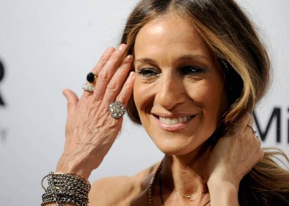 Sarah Jessica Parker arrives on the red carpet at amfAR s 5th Annual Inspiration Gala at the Plaza Hotel in New York City on June 10, 2014. NYP20140610124