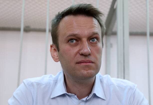 ITAR-TASS: MOSCOW, RUSSIA. AUGUST 14, 2014. Opposition leader Alexei Navalny appears at the Moscow Zamoskvoretsky District Court for a hearing into the Yves Rocher case against him and his brother Oleg. The Navalny brothers are charged with embezzling 26,7 million rubles from Yves Rocher Vostok cosmetics company.  Aufmacher RE14CD98