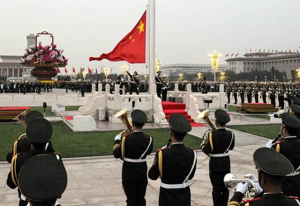 (141001) -- BEIJING, Oct. 1, 2014 -- A flag-raising ceremony marking the 65th anniversary of the founding of the People s Republic of China is held at the Tian anmen Square in Beijing, capital of China, Oct. 1, 2014, also the Chinese National Day. ) (lfj) CHINA-NATIONAL DAY-FLAG-RAISING CEREMONY (CN) TangxZhaoming
