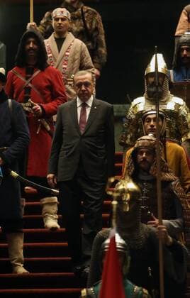 Turkish President Recep Tayyip Erdogan in front of 16 soldiers who represent the 16 Turkish states founded in the past at the presidential palace in Ankara, Turkey on January 12, 2015