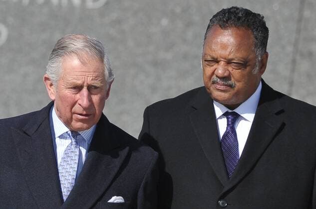 Britain s Prince Charles walks with civil rights leader Jesse Jackson during a visit to the Martin Luther King Memorial Jr. Memorial on March 18, 2015 in Washington, DC. Prince Charles (C) and his wife Camilla, Duchess of Cornwall, are on a four-day trip to the United States. Pool  WAX20150318159 MANDELxNGAN