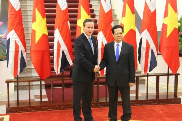 (150729) -- HANOI, July 29, 2015 -- Vietnamese Prime Minister Nguyen Tan Dung (R) meets visiting British Prime Minister David Cameron in Hanoi, Vietnam, July 29, 2015. ) VIETNAM-HANOI-BRITAIN-PM-VISIT LexYanna 
