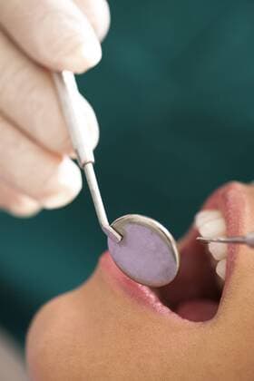 Young woman receiving dental care  StefanoxLunardi