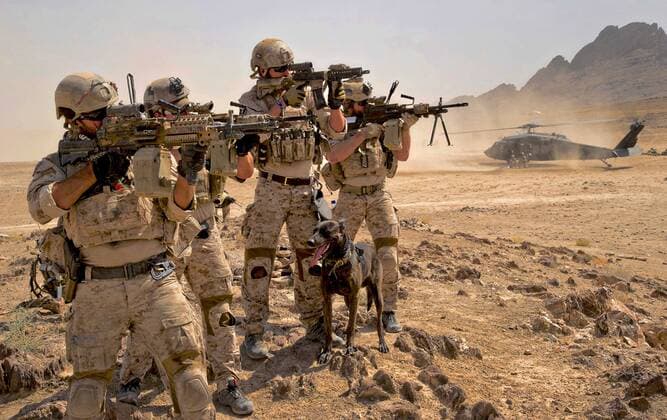 Aug. 12, 2012 - Shah Wali Kot, Kandahar, Afghanistan - US special force commandos provide security as troops off-load from a Black Hawk helicopter during a clearing operation August 12, 2012 in Shah Wali Kot district, Kandahar province, Afghanistan. Shah Wali Kot Afghanistan - ZUMAp138