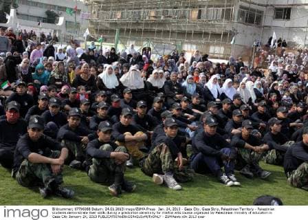 Jan. 24, 2013 - Gaza City, Gaza Strip, Palestinian Territory - Palestinian students demonstrate their skills during a graduation ceremony for martial arts course organized by Palestinian ministry of education in Gaza City January 24, 2013  - ZUMAews
