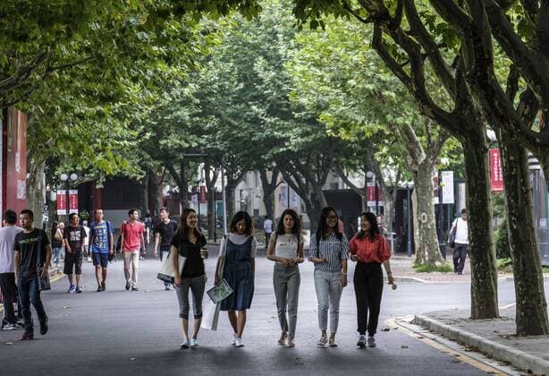 September 9, 2016 - Los Angeles, California, U.S - Student walk at Jiao Tong University campus in Shanghai, China. Shanghai is the most populous city in China and the most populous city proper in the world. It is one of the four direct-controlled municipalities of China, with a population of more than 24 million as of 2014. It is a global financial centre, and a transport hub with the world s busiest container port. Located in the Yangtze River Delta in East China, Shanghai sits on the south edge of the mouth of the Yangtze in the middle portion of the Chinese coast. The municipality borders the provinces of Jiangsu and Zhejiang to the north, south and west, and is bounded to the east by the East China Sea. A major administrative, shipping, and trading town, Shanghai grew in importance in the 19th century due to trade and recognition of its favourable port location and economic potential - ZUMAc68_