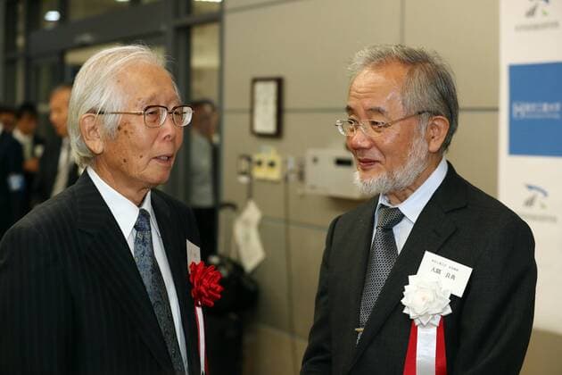 October 7, 2016, Yokohama, Japan - Tokyo Institute of Technology president professor Yoshinori Ohsumi (R) chats with 2000 Nobel Prize laureate Hideki Shirakawa during a reception at the Suzukakedai campus of Tokyo Institute of Technology in Yokohama, suburban Tokyo on Friday, October 7, 2016. Ohsumi received the Nobel Prize in Physiology or Medicine 2016.  (lwxa005258)