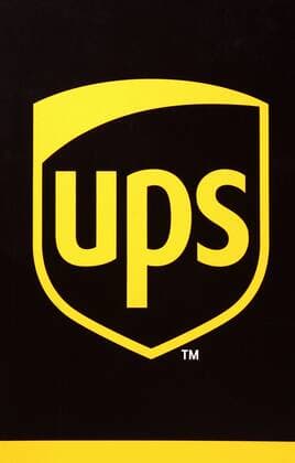 24.02.2006, Magdeburg, Sachsen-Anhalt, Deutschland - Logo des Paketdienstes ups. Die 1907 in den USA gegruendete Firma ist sowohl Express- und Paketzustelldienst als auch ein Anbieter spezialisierter Befoerderungs-, Logistik-, Kapital- und E-Commerce-Serviceleistungen. (HF, Päckchen) 00S060224D712.JPG MODEL RELEASE: NOT APPLICABLE, PROPERTY RELEASE: NO MR:Y