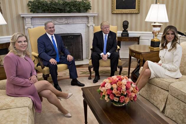 U.S. First Lady Melania Trump, from right, U.S. President Donald Trump, Benjamin Netanyahu, Israel s prime minister, and his wife Sara Netanyahu sit in the Oval Office of the White House in Washington, D.C., U.S., on Wednesday, Feb. 15, 2017. Netanyahu is trying to recalibrate ties with Israel s top ally after eight years of high-profile clashes with former President Barack Obama, in part over Israel s policies toward the Palestinians. Pool photo by Andrew Harrer WAX20170215307 AndrewxHarrer