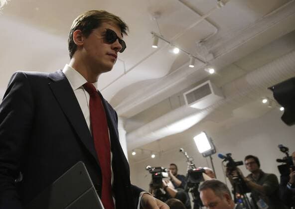 Breitbart tech editor Milo Yiannopoulos exits the room after he announces his resignation when he speaks during a news conference in New York City on February 21, 2017. Yiannopoulos resigned after a firestorm over his comments in which he appeared to condone pedophilia.  NYP20170221102 JOHNxANGELILLO