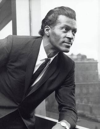CHUCK BERRY (October 18, 1926 - March 18, 2017) was an American guitarist, singer and songwriter and is one of the pioneers of rock and roll music. With iconic songs such as Maybellene (1955), Roll Over Beethoven (1956), Rock and Roll Music (1957) and Johnny B. Goode (1958), Berry refined and developed rhythm and blues into the major elements that made rock and roll distinctive, with lyrics focusing on teen life and consumerism and music featuring guitar solos and showmanship that were a major influence on subsequent rock music. PICTURED: CHUCK BERRY in 1964.  - ZUMA 19640112_mda_g49_001 Copyright: xGlobexPhotosx