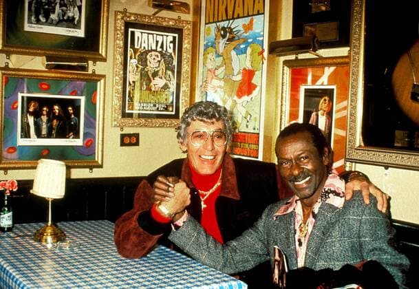 CHUCK BERRY (October 18, 1926 - March 18, 2017) was an American guitarist, singer and songwriter and is one of the pioneers of rock and roll music. With iconic songs such as Maybellene (1955), Roll Over Beethoven (1956), Rock and Roll Music (1957) and Johnny B. Goode (1958), Berry refined and developed rhythm and blues into the major elements that made rock and roll distinctive, with lyrics focusing on teen life and consumerism and music featuring guitar solos and showmanship that were a major influence on subsequent rock music. PICTURED: Rock-n-Roll pioneers CARL PERKINS and CHUCK BERRY in 1994.  - ZUMA 20050114_mda_g49_132 Copyright: xWalterxWeissmanx