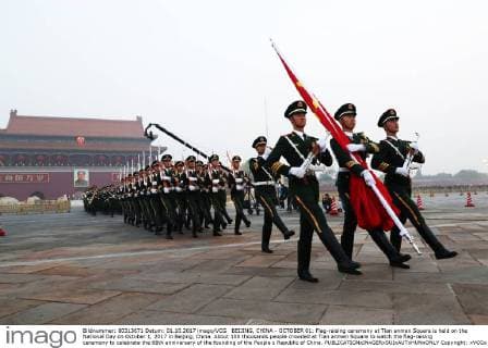 BEIJING, CHINA - OCTOBER 01: Flag-raising ceremony at Tian anmen Square is held on the National Day on October 1, 2017 in Beijing, China. About 100 thousands people crowded at Tian anmen Square to watch the flag-raising ceremony to celebrate the 68th anniversary of the founding of the People s Republic of China. Copyright: xVCGx CFP111128810684