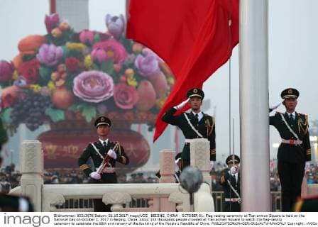 BEIJING, CHINA - OCTOBER 01: Flag-raising ceremony at Tian anmen Square is held on the National Day on October 1, 2017 in Beijing, China. About 100 thousands people crowded at Tian anmen Square to watch the flag-raising ceremony to celebrate the 68th anniversary of the founding of the People s Republic of China. Copyright: xVCGx CFP111128810685