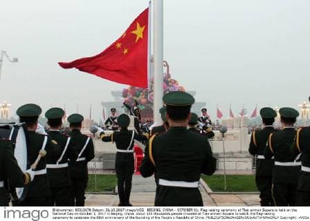 BEIJING, CHINA - OCTOBER 01: Flag-raising ceremony at Tian anmen Square is held on the National Day on October 1, 2017 in Beijing, China. About 100 thousands people crowded at Tian anmen Square to watch the flag-raising ceremony to celebrate the 68th anniversary of the founding of the People s Republic of China. Copyright: xVCGx CFP111128815007