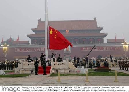 BEIJING, CHINA - OCTOBER 01: Flag-raising ceremony at Tian anmen Square is held on the National Day on October 1, 2017 in Beijing, China. About 100 thousands people crowded at Tian anmen Square to watch the flag-raising ceremony to celebrate the 68th anniversary of the founding of the People s Republic of China. Copyright: xVCGx CFP111128818274