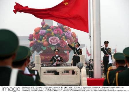 BEIJING, CHINA - OCTOBER 01: Flag-raising ceremony at Tian anmen Square is held on the National Day on October 1, 2017 in Beijing, China. About 100 thousands people crowded at Tian anmen Square to watch the flag-raising ceremony to celebrate the 68th anniversary of the founding of the People s Republic of China. Copyright: xVCGx CFP111128810682