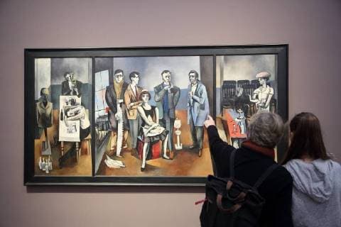 Visitors in the Paintings the Friends Harald Metzkes 1957 during a Tour in the Exhibition behind the Mask Artists in the GDR in Museum Barberini in Potsdam 26 October 2017 Exhibition Dates 29 October 2017 until 4 February 2018 Exhibition behind the Mask Artists in the GDR