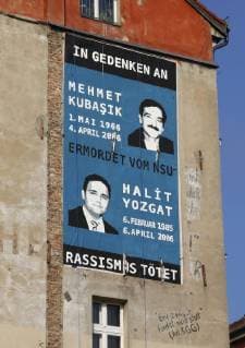 Berlin Kreuzberg March 2014 since the 25 3 2014 hang middle in Kreuzberg to the Wall the House Oranienstr Corner a Huge Mural Widely visible above the Total Junction at Görlitzer Station to see Two Portraits to read the Name Mehmet Kubasik and Halit Yozgat with Childbirth and De