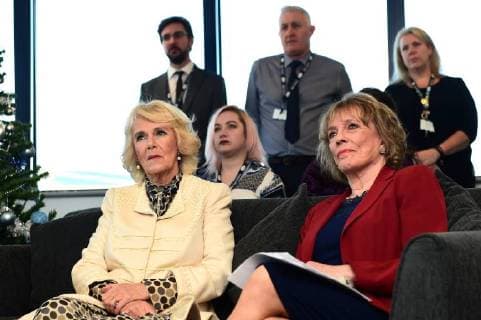 . 08 12 2017. Blackpool, United Kingdom. The Duchess of Cornwall visits the offices of The Silver Line, a free confidential helpline for elderly people in Blackpool, United Kingdom. With Dame Esther Rantzen (right)  xROTAx xi-Imagesx IIM-16543-0014