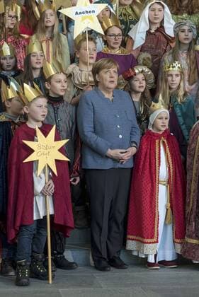 Federal Chancellor Dr Angela Merkel CDU receives the carolers from the German dioceses in the Berlin Chancellery snapshot photography F Boillot