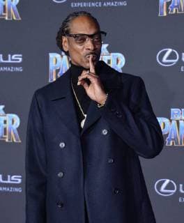 Recording artist Snoop Dogg attends the premiere of the sci-fi motion picture Black Panther at the Dolby Theatre in the Hollywood section of Los Angeles on January 29, 2018. Storyline: T Challa, after the death of his father, the King of Wakanda, returns home to the isolated, technologically advanced African nation to succeed to the throne and take his rightful place as king.  LAP2018012927 JIMxRUYMEN