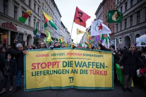 Demonstrate protest Afrin several thousand people in Berlin against the attacks of the Turkish military on the Syrian city Afrin Turkey going on JPG and YPJ militarily against the Kurdish army units which with support of the United States against the Islamist Do the terrorists of the so-called Islamic State protesters with banners Gabriel served Erdogan bombed stop arms shi