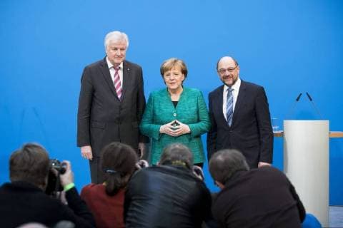 Angela Merkel Horst Seehofer and Martin Schulz federal party headquarters Konrad Adenauer House in Berlin posing for the photographers at the end of a press conference for the announcement of the compromise reached in the coalition agreement in the CDU on 7 February 2018 Coalition talks in Berlin