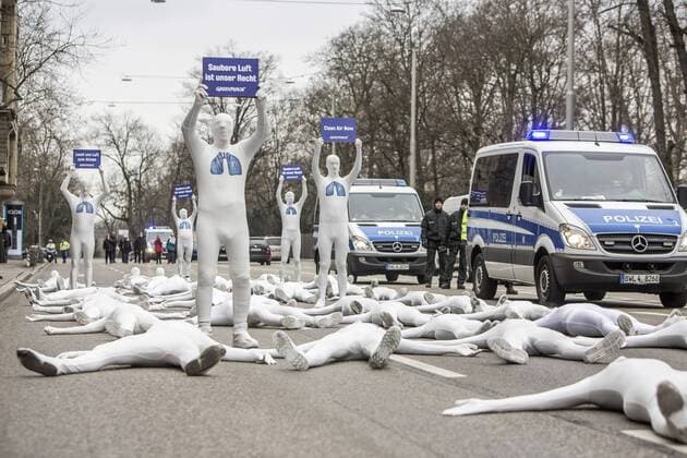 Germany Stuttgart 19 02 2018 the environmental organisation Greenpeace demonstrated on Highway 14 in Stuttgart round 40 activists not only request clean air particulates main street of the Republic Neckar goal in Stuttgart is considered the most heavily burdened Street in Germany Â