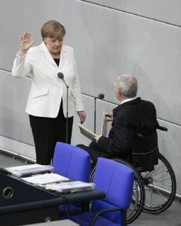 Chancellor Angela Merkel L CDU and Wolfgang Schaeuble CDU in the context of the swearing-in of the new Federal Government in Berlin 14 03 2018 Berlin Germany Copyright: xXanderxHeinl photothek.netx