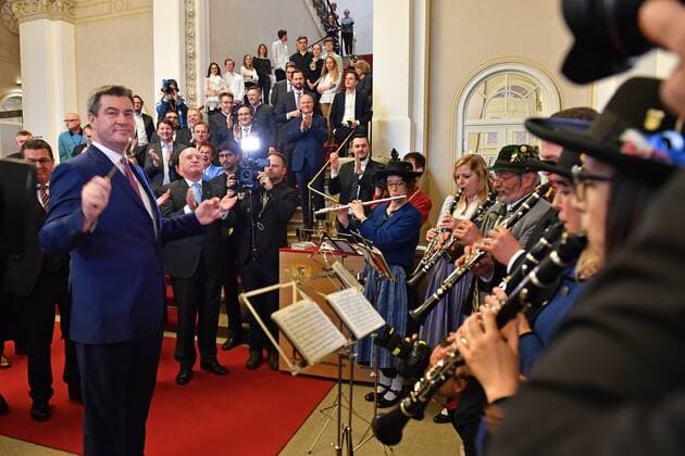 Markus SOEDER Bavarian State Premier conducts a traditional band playing the Bavarian Defilier March Election and swearing-in ceremony of the new Bavarian State Premier on 16 03 2018 in the Bavarian State Parliament Maximilianeum in Munich 126 Meeting of the Bavarian State Parliament