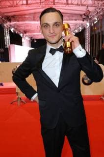 Franz Rogowski telephoned Lola at the awards ceremony Deutscher Filmpreis Palais am Funkturm Masurenallee Hammarskjöldplatz Berlin Date 27 04 2018 68 Deutscher Filmpreis