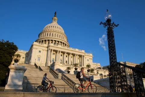 September 28, 2013 - Washington, District of Columbia : People ride bicycles in front of the United States Capitol building, home of the U.S. Congress, the legislature of the U.S. federal government. CREDIT: Photo by Karsten Moran, Washington DC District of Columbia USA - United States of America Copyright: KarstenxMoran 4958200001