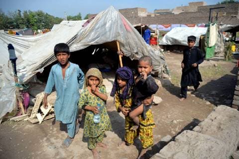 (181017) -- PESHAWAR, Oct. 17, 2018 -- Children play outside their shelters at a slum on the outskirts of northwest Pakistan s Peshawar on Oct. 17, 2018. Designated to promote awareness of the need to eradicate poverty and destitution in all countries, the International Day for the Eradication of Poverty has been observed on Oct. 17 every year since 1993. ) (wtc) PAKISTAN-PESHAWAR-INTERNATIONAL DAY FOR ERADICATION OF POVERTY UmarxQayyum 