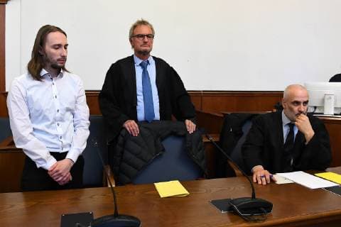 Trial over the bomb attack on the BVB bus on 27 11 2018 at the District Court in Dortmund The defendant Sergej W stands in the courtroom of the District Court alongside his lawyers Carl Heydenreich m and Christos Psaltiras r The Dortmund Court of Appeals has been hearing the bomb attack on Borussia Dortmunds team for eleven months xRx