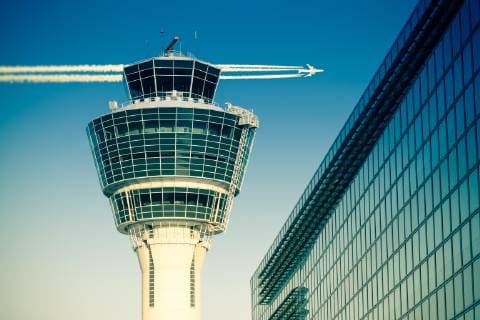 Flights management air control tower passenger terminal and flying plane  Copyright: xservickuzx Panthermedia18064368