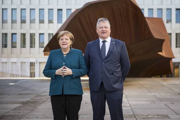 Bruno Kahl R President of the Federal Intelligence Service BND and Chancellor Angela Merkel CDU recorded in front of the monolith during the opening of the headquarters of the Federal Intelligence Service in Berlin 08 02 2019 Berlin Germany Copyright: xFlorianxGaertner photothek.netx