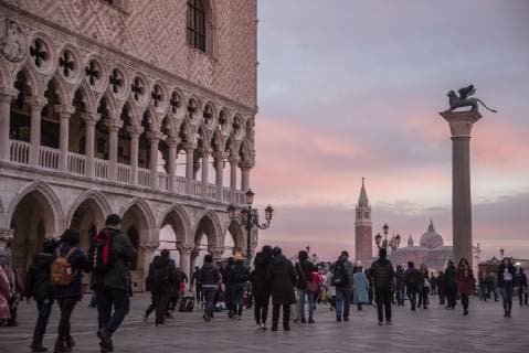 City views of Venice Municipal Council allows entrance fee for Italian canal city Venice 11 02 2019 Numerous tourists walk across St Marks Square in Venice The Municipal Council has approved t VENEZIA