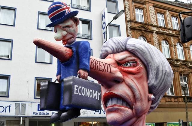 Germany NRW Düsseldorf Carnival Rosenmontagszug Theme Car by Jaques Tilly British Prime Minister Theresa May and the Brexit