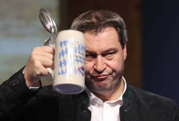Political Ash Wednesday of the CSU in Passau Dr Markus Söder drinks a measure of beer Passau Germany Dreiländerhalle