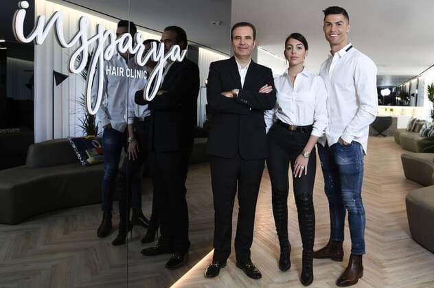 Paolo Ramos Georgina Rodriguez and Cristiano Ronaldo at the opening of the Hair Transplant Clinic Insparya Hair Clinic Madrid 18 03 2019 Paolo Ramos Georgina Rodriguez Cristiano Ronaldo  Foto:xDyDxFotografosx xFuturexImage